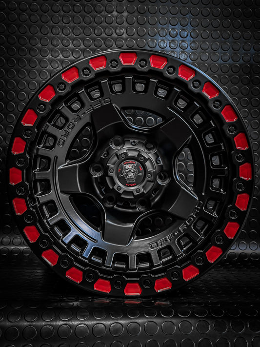 4 llantas 17x9 6x139.7 et 0 negra mate con detalles en rojo